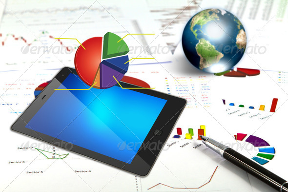 Touch pad and financial Graphs - Stock Photo - Images