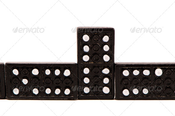 Sequence of black domino parts isolated on white - Stock Photo - Images