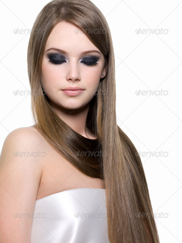 Woman with eye make-up and long hair - Stock Photo - Images