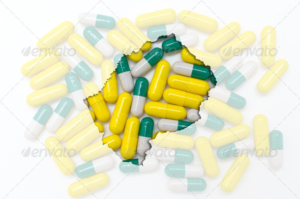 Outline map of lesotho with pills in the background for health a - Stock Photo - Images