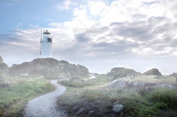 Cape Foulwind Lighthouse in the fog - Stock Photo - Images