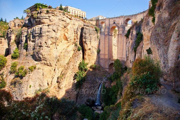 New bridge and falls in Ronda white village. Andalusia, Spain. - Stock Photo - Images