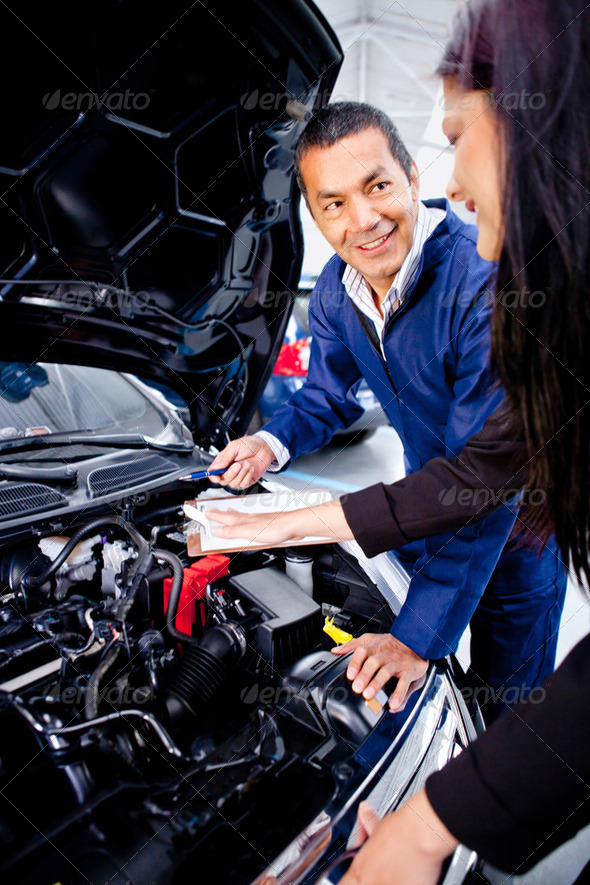Woman at the mechanic - Stock Photo - Images