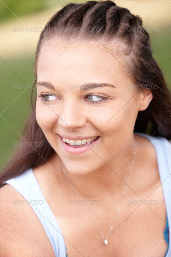 smiling girl with braided hair - Stock Photo - Images