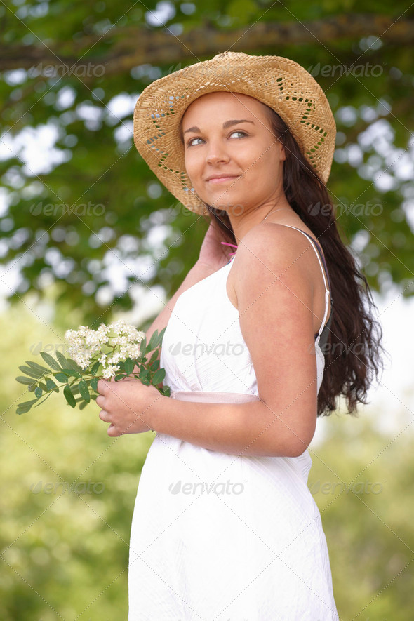 girl wearing summer hat - Stock Photo - Images