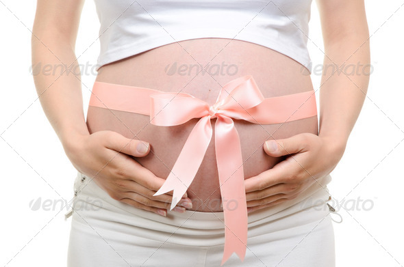 Pregnant Belly With Pink Ribbon - Stock Photo - Images