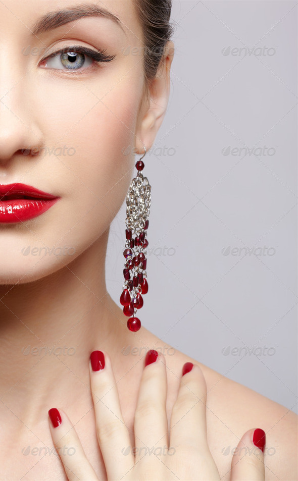 beautiful woman in ear-rings - Stock Photo - Images