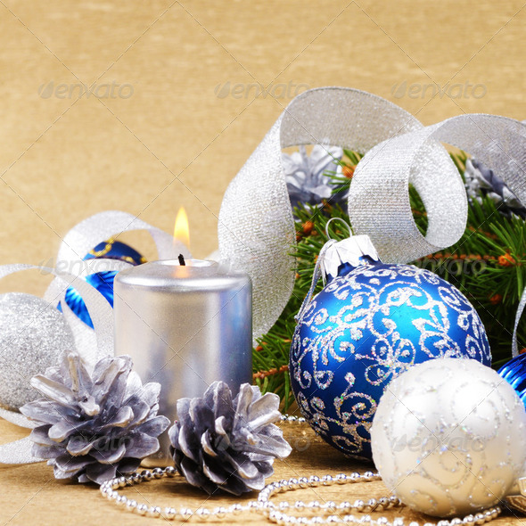Blue and white christmas balls with silver candle - Stock Photo - Images