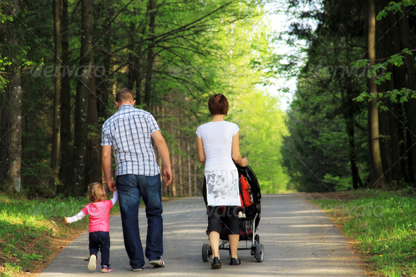 Young family in the park - Stock Photo - Images