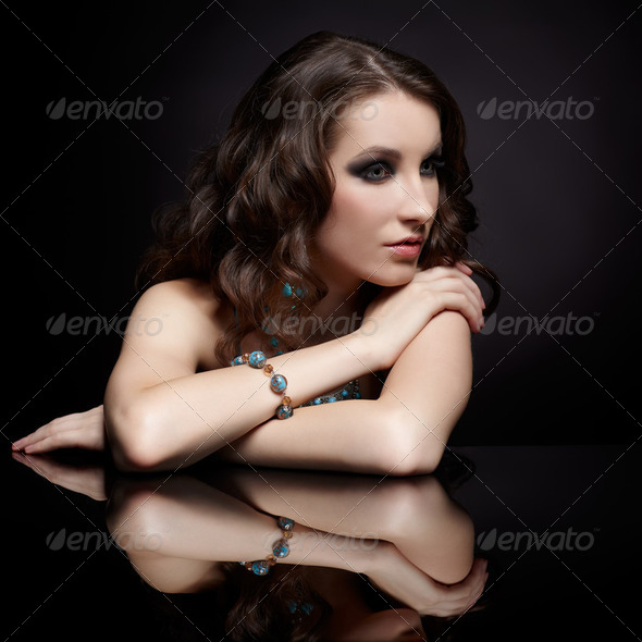 brunette woman and mirror - Stock Photo - Images