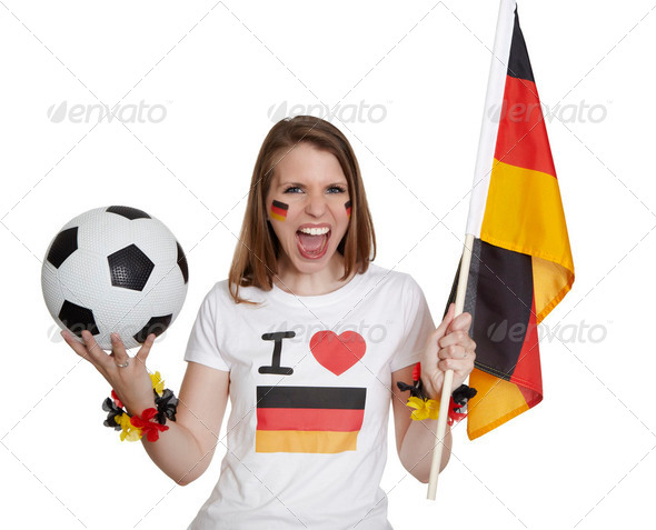 Attractive woman shows german flag and football and screams in front of white background - Stock Photo - Images