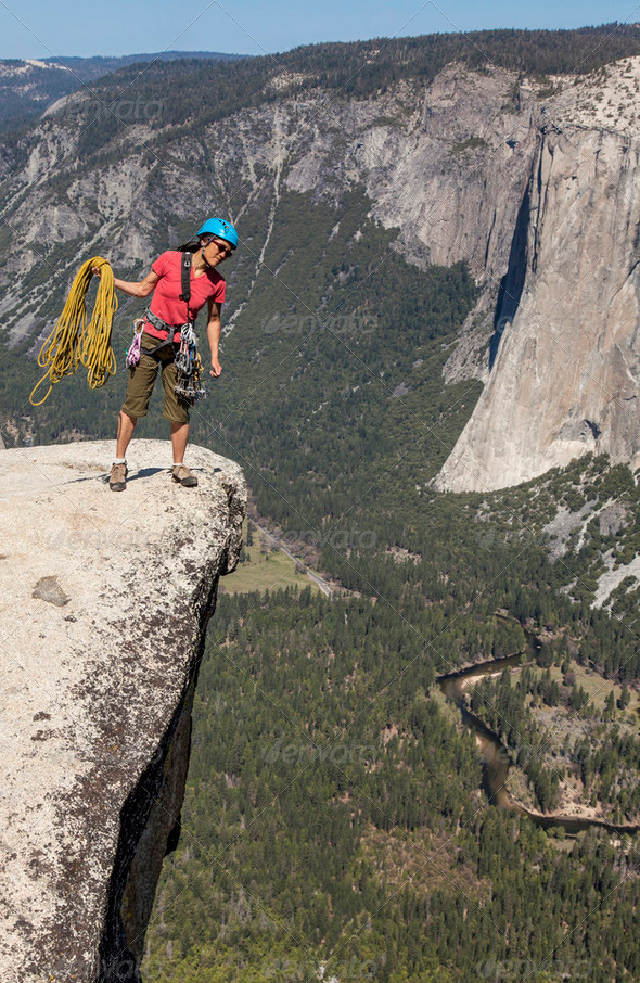 Climber on the summit. - Stock Photo - Images
