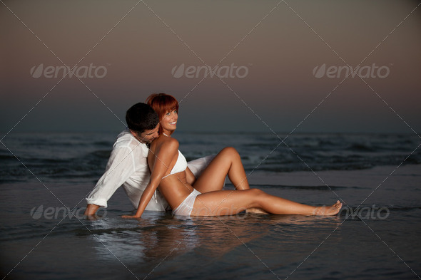 happy, romantic couple, by the sea shore - Stock Photo - Images