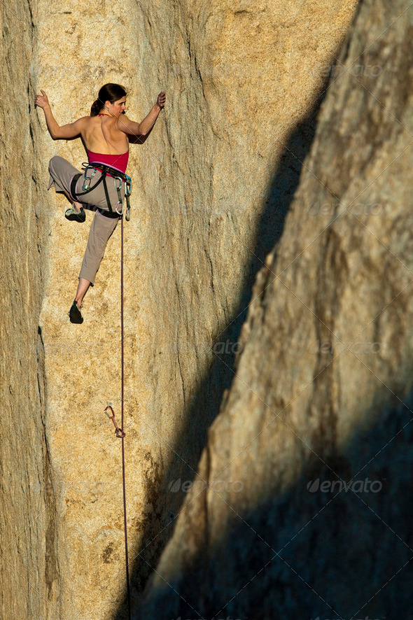 Female rock climber. - Stock Photo - Images