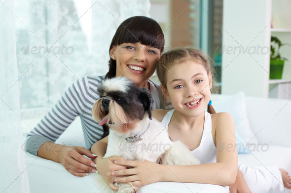 Mother, daughter and pet - Stock Photo - Images