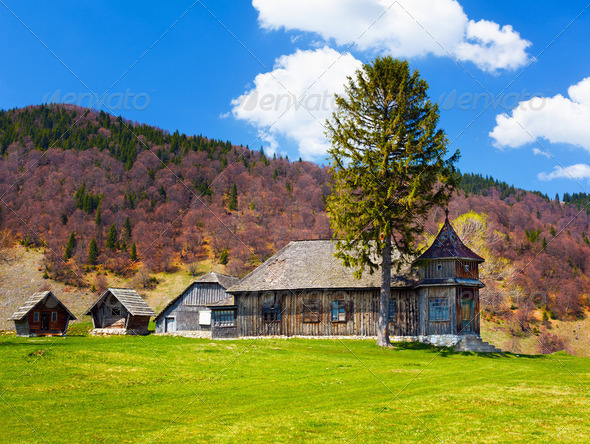 Wooden house and mountains - Stock Photo - Images