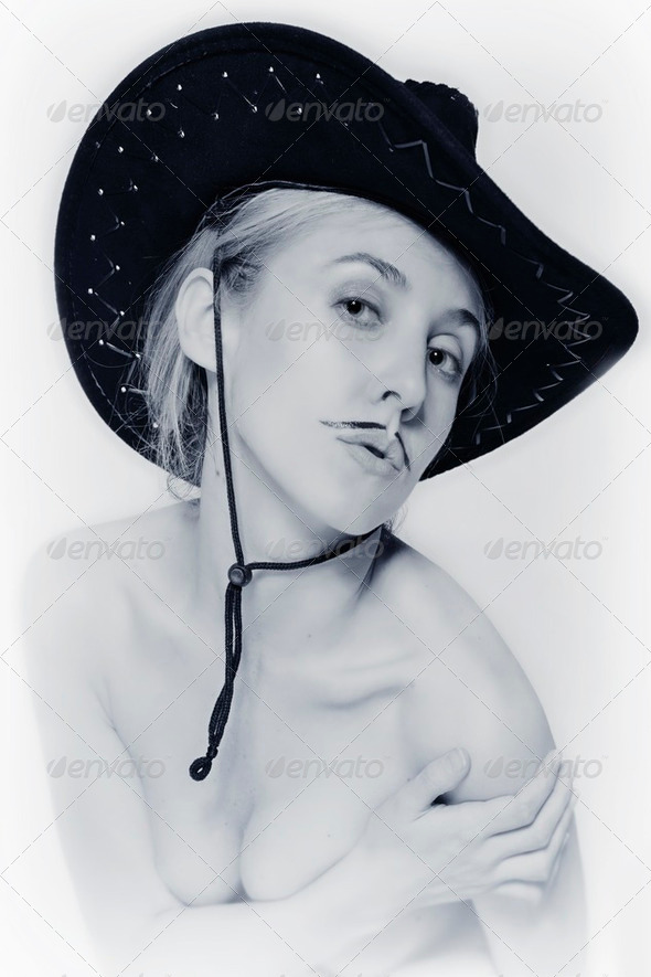 Naked women with mustache wearing cowboy hat - Stock Photo - Images