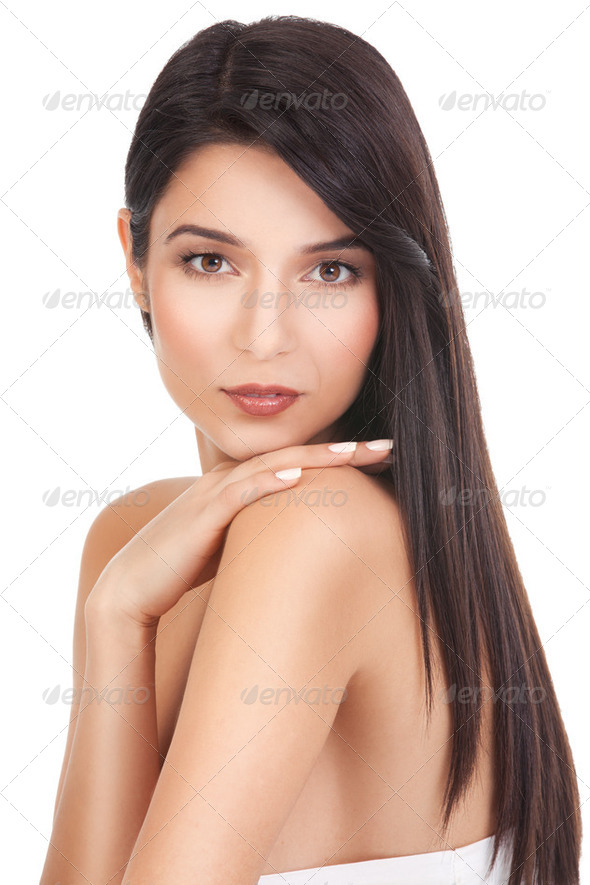 beauty portrait of a young woman, looking over her shoulder - Stock Photo - Images