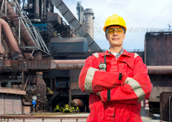 Factory worker in overalls - Stock Photo - Images