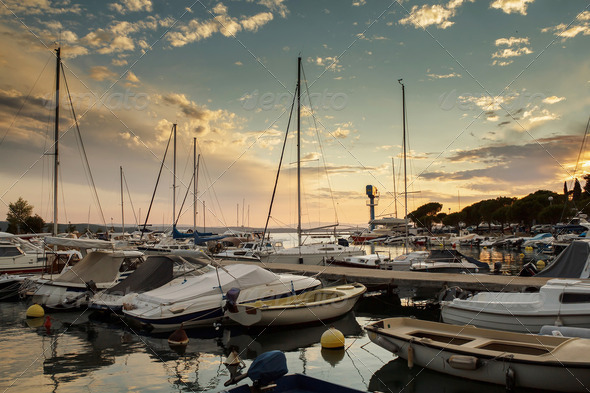 Cruise boats in Adriatic sea with sunset light - Stock Photo - Images