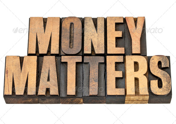 money matters in wood type - Stock Photo - Images