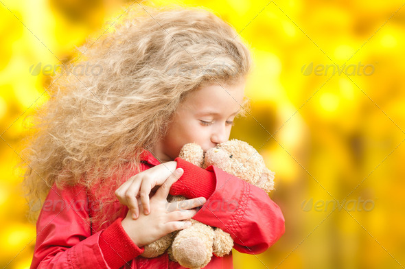 beautiful little girl with teddy bear - Stock Photo - Images
