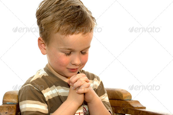 praying little boy