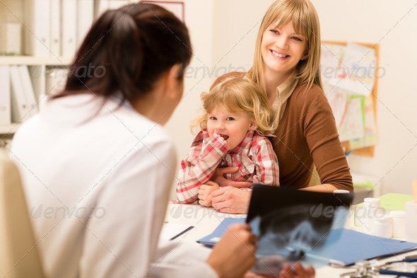 At the pediatrician office mother and daughter - Stock Photo - Images