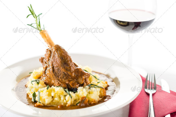 Lamb knee in sauce with mashed potatoes - Stock Photo - Images