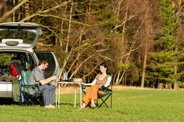 Camping car young couple enjoy picnic countryside - Stock Photo - Images