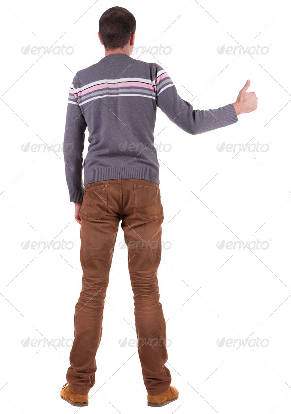 Back view of man shows thumbs up. - Stock Photo - Images