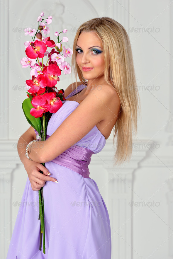 Beautiful woman with orchid - Stock Photo - Images