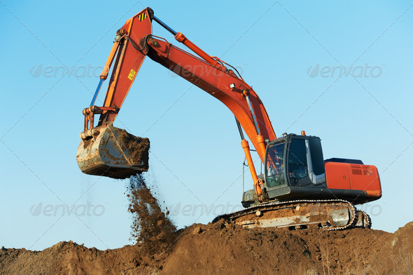 track-type loader excavator at work - Stock Photo - Images