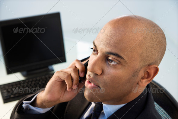Businessman on phone - Stock Photo - Images
