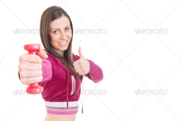 Positive fit girl with dumbbell - Stock Photo - Images