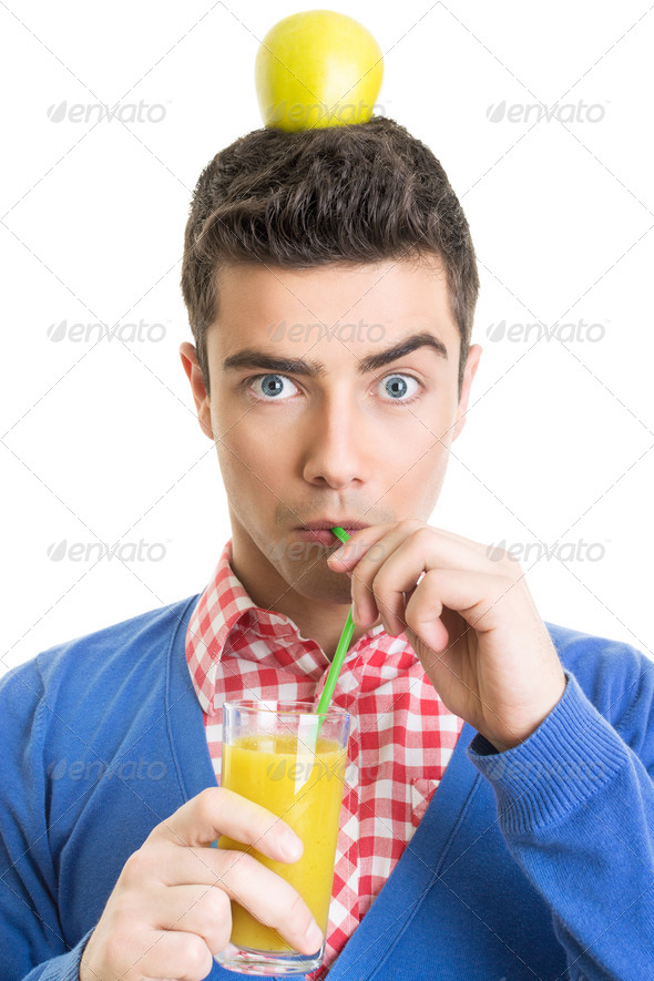 Funny nerd guy drinking fresh juice with straw - Stock Photo - Images