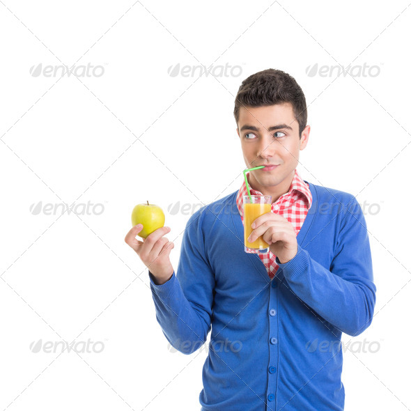 Funny young man with healthy refreshing juice - Stock Photo - Images