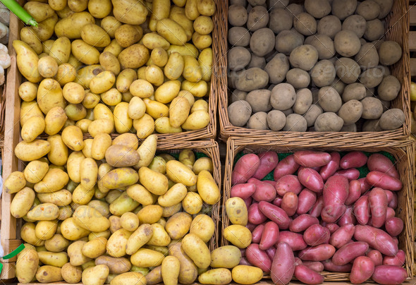 Different kinds of potatoes for sale at a market