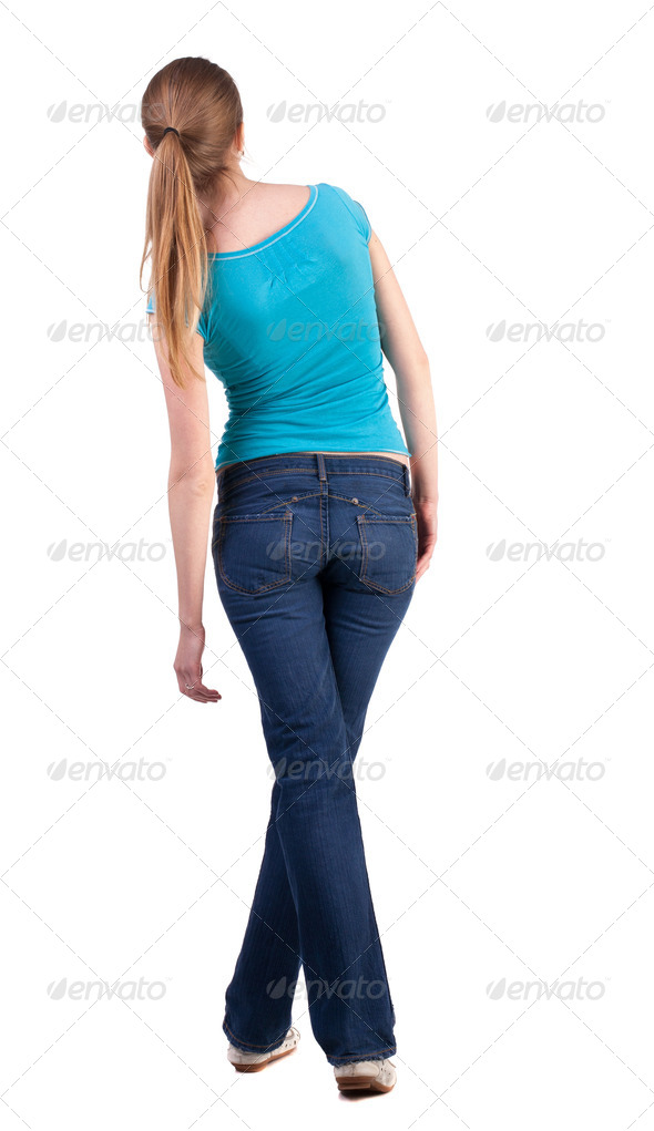 back view of standing young beautiful blonde woman - Stock Photo - Images