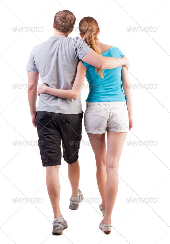 Back view of going young couple - Stock Photo - Images