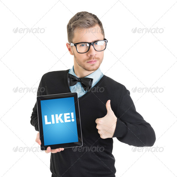 Elegant businessman holding digital tablet that states like - Stock Photo - Images