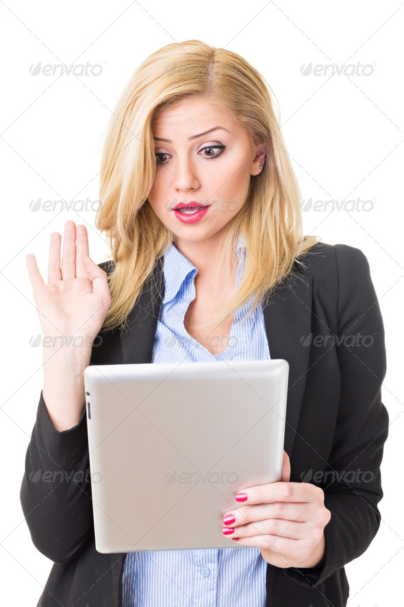 Surprised businesswoman with tablet computer - Stock Photo - Images