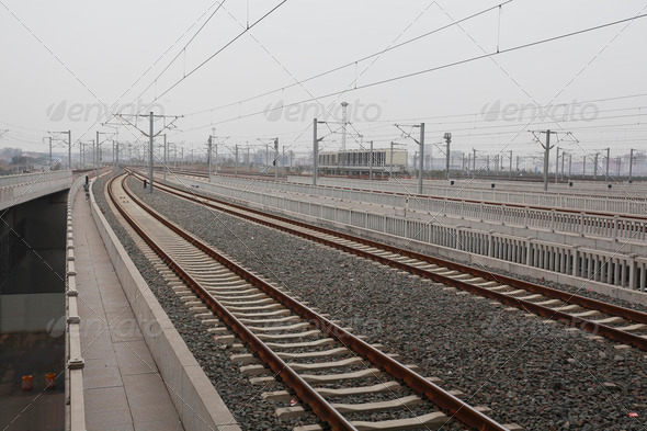 High-speed rail at railroad metal track with track bed