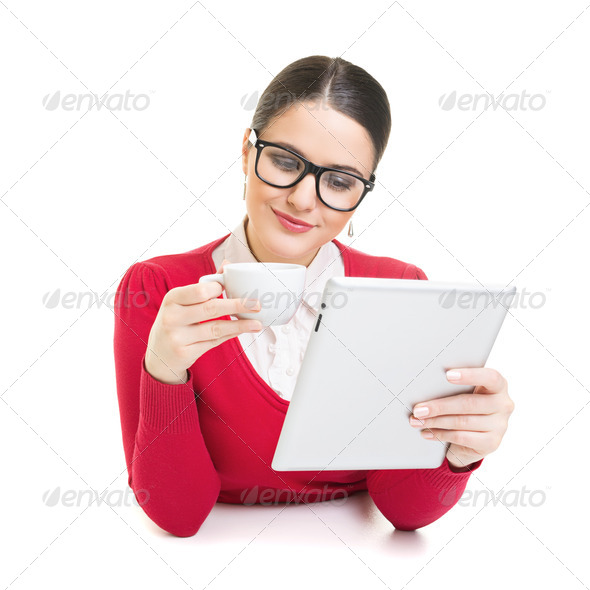 Businesswoman having a coffee break at work - Stock Photo - Images