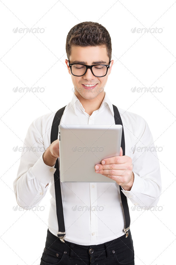 Happy handsome businessman with glasses using tablet computer - Stock Photo - Images