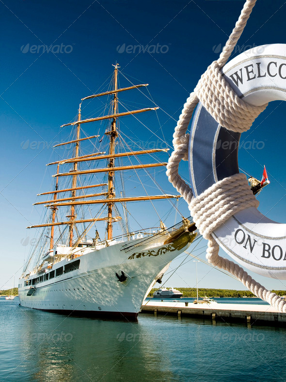 view on the sailing ship thrue blue safe belt with welcome on board sign
