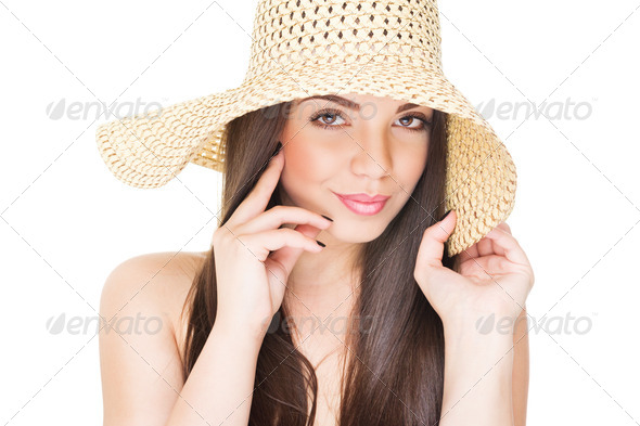 Beautiful brunette wearing summer straw hat - Stock Photo - Images