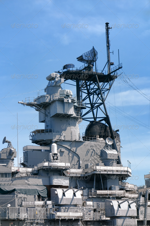 Command tower with radar and communication equipment above antiaircraft guns weapons on a US navy battleship