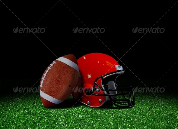 American Football and Helmet on Field