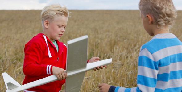 VideoHive Boys with a Toy Airplane 5575104 VideoHive Boys with a Toy Airplane 5575104